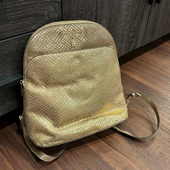 MICHAEL Michael Kors Handbags - Michael Kors Pre Loved backpack in Gold metallic W/  wear mainly inside & straps